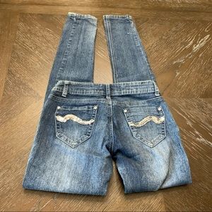Rue 21 faded skinny jeans w/ sequin design pockets Size 0